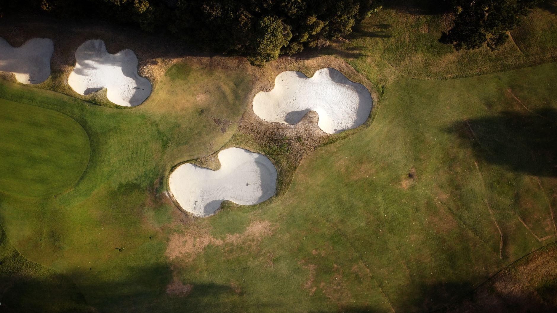 6. Bunker Renovation vs. Top Dressing: Choosing the Right Approach